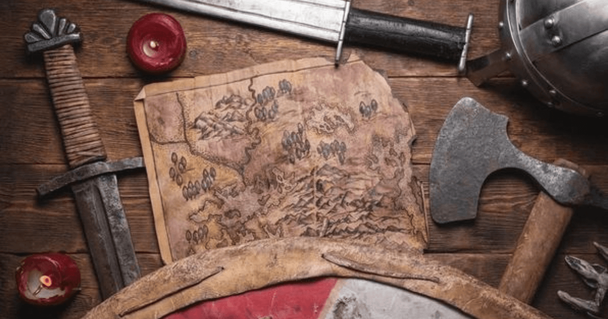 An ancient map and a sword, representing the history of war